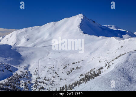 Snow covered Colorado Rocky Mountains in winter from Copper Mountain Ski Resort Stock Photo