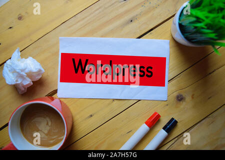 Wordpress write on the tissue with wooden table background Stock Photo