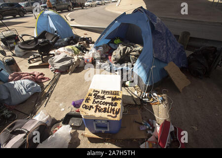 Austin, Texas, USA. 1st Nov, 2019. Days before a threatened crackdown by Texas Governor Greg Abbott on public right-of-way camping, homeless Texans await the governor's and highway department actions. Most are unsure where they will go as local shelters are over capacity. Credit: Bob Daemmrich/ZUMA Wire/Alamy Live News Stock Photo