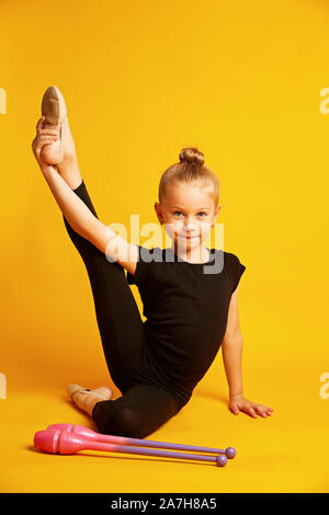 Beautiful Athletic Young Girl in Sportswear, Doing Exercises for Stretching  on the Street, the Element of Gymnastics Stock Photo - Image of caucasian,  dark: 156369124