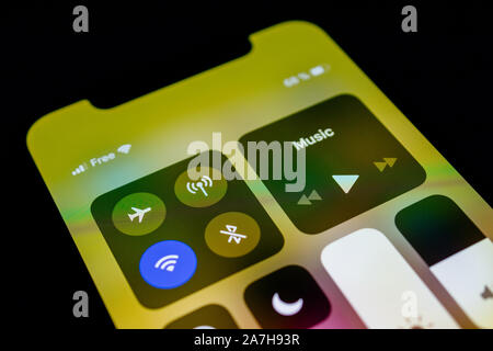Paris, France - Nov 11, 2017: Close-up macro details Latest Apple Computers iPhone 11 Pro featuring Control Center menu with Flight mode, wi-fi, cellu Stock Photo