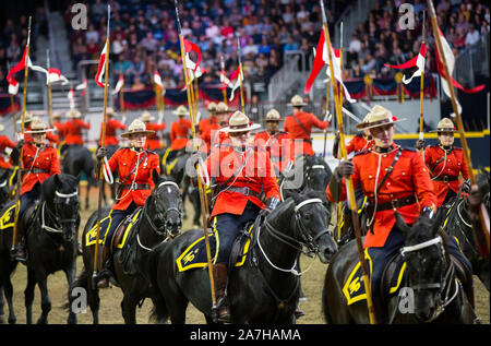 Toronto, Canada. 2nd Nov, 2019. Members of the Royal Canadian Mounted Police (RCMP) perform during the RCMP Musical Ride at the 2019 Royal Agricultural Winter Fair in Toronto, Canada, on Nov. 2, 2019. Credit: Zou Zheng/Xinhua/Alamy Live News Stock Photo