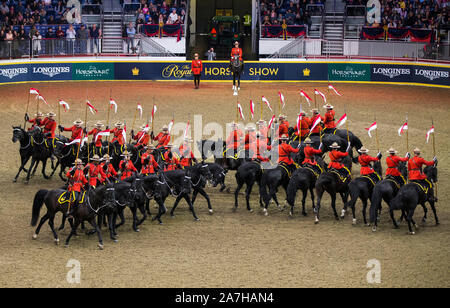 Toronto, Canada. 2nd Nov, 2019. Members of the Royal Canadian Mounted Police (RCMP) perform during the RCMP Musical Ride at the 2019 Royal Agricultural Winter Fair in Toronto, Canada, on Nov. 2, 2019. Credit: Zou Zheng/Xinhua/Alamy Live News Stock Photo