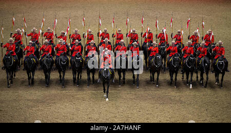 Toronto, Canada. 2nd Nov, 2019. Members of the Royal Canadian Mounted Police (RCMP) perform during the RCMP Musical Ride at the 2019 Royal Agricultural Winter Fair in Toronto, Canada, on Nov. 2, 2019. Credit: Zou Zheng/Xinhua/Alamy Live News Stock Photo