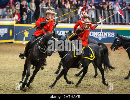 Toronto, Canada. 2nd Nov, 2019. Members of the Royal Canadian Mounted Police (RCMP) perform during the RCMP Musical Ride at the 2019 Royal Agricultural Winter Fair in Toronto, Canada, on Nov. 2, 2019. Credit: Zou Zheng/Xinhua/Alamy Live News Stock Photo