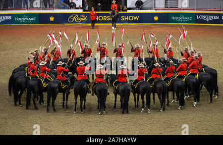 Toronto, Canada. 2nd Nov, 2019. Members of the Royal Canadian Mounted Police (RCMP) perform during the RCMP Musical Ride at the 2019 Royal Agricultural Winter Fair in Toronto, Canada, on Nov. 2, 2019. Credit: Zou Zheng/Xinhua/Alamy Live News Stock Photo