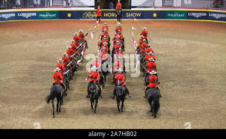 Toronto, Canada. 2nd Nov, 2019. Members of the Royal Canadian Mounted Police (RCMP) perform during the RCMP Musical Ride at the 2019 Royal Agricultural Winter Fair in Toronto, Canada, on Nov. 2, 2019. Credit: Zou Zheng/Xinhua/Alamy Live News Stock Photo