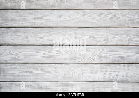 Wooden background texture. Creatively painted white and grey boards. Stock Photo