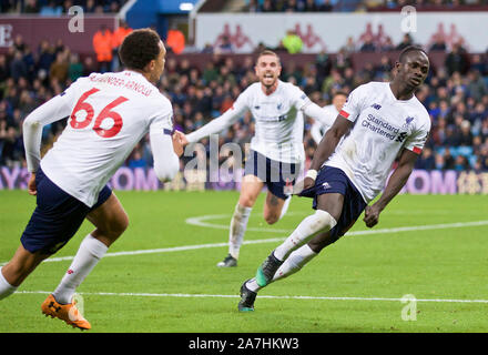 Birmingham. 3rd Nov, 2019. Liverpool's Sadio Mane (R) celebrates scoring a goal in injury time during the English Premier League match between Aston Villa and Liverpool in Birmingham, Britain on Nov. 2, 2019. FOR EDITORIAL USE ONLY. NOT FOR SALE FOR MARKETING OR ADVERTISING CAMPAIGNS. NO USE WITH UNAUTHORIZED AUDIO, VIDEO, DATA, FIXTURE LISTS, CLUB/LEAGUE LOGOS OR 'LIVE' SERVICES. ONLINE IN-MATCH USE LIMITED TO 45 IMAGES, NO VIDEO EMULATION. NO USE IN BETTING, GAMES OR SINGLE CLUB/LEAGUE/PLAYER PUBLICATIONS. Credit: Xinhua/Alamy Live News Stock Photo