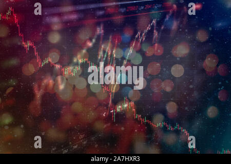 Trading graphs and digital number on monitor. Background of gold and blue digital chart to represent stock market trend. Stock Photo