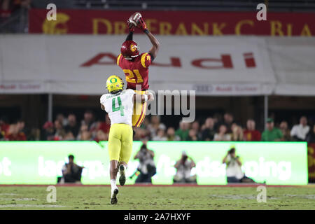 November 2, 2019: USC Trojans wide receiver Tyler Vaughns (21) leaps for a first down reception during the game between the Oregon Ducks and the USC Trojans at the Los Angeles Memorial Coliseum, Los Angeles, CA USA (Photo by Peter Joneleit/Cal Sport Media)
