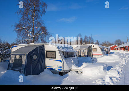 Winter camping ground with caravans in the winter Stock Photo