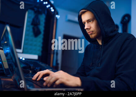 Programmer working on laptop, computer technology