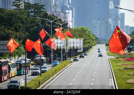 Red Chinese flags set up on a main road in Shenzhen city, south China's Guangdong province, 22 September 2019. Stock Photo