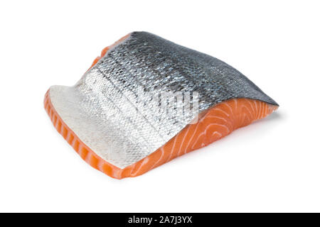 Piece of fresh raw salmon fillet with silver skin isolated on white background Stock Photo