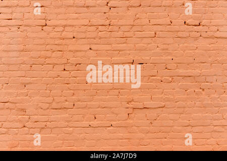Painted brick wall pastel coral tone. Background. Stock Photo