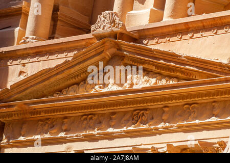 Roof carfed in stones to create the Monastry (aka Al-Khazneh) facade in Petra.  The facade with all details is very well preserved the last 2 milleniu Stock Photo