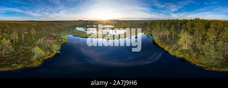 Sunrise in the bog landscape. Misty marsh, lakes nature environment background Stock Photo