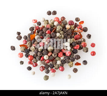 Mixed of diffrent kind peppercorns isolated on white background Stock Photo