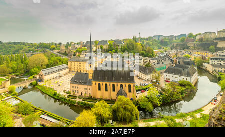 Alzette river bend with Saint Jean Du Grund cathedral, Luxembourg city, Luxembourg Stock Photo