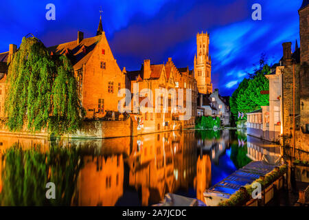 Bruges, Belgium. The Rozenhoedkaai canal in Bruges with the Belfry in the background. Stock Photo