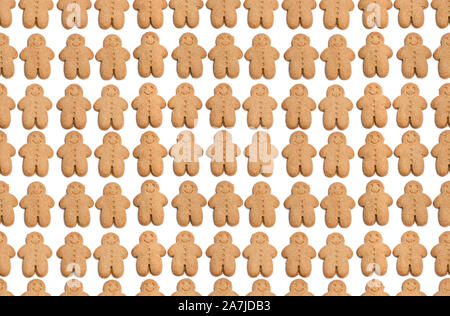 Seamless  Endless pattern of baked gingerbread man cookies isolated on white Stock Photo