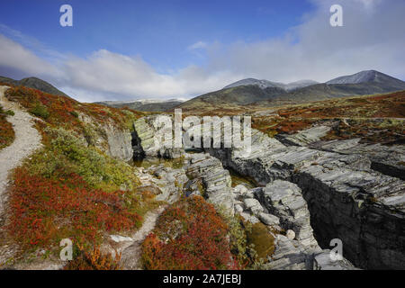 Summer at the Rondane National Park in Norway near Smuksjøseter fjellstue and Høvringen. Included are mountains and Peer Gynt cabin in the park. Stock Photo