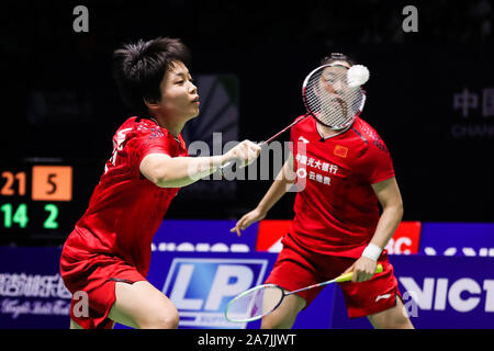 Chinese professional badminton players Jia Yifan and Chen Qingchen compete against Japanese professional badminton players Misaki Matsutomo and Ayaka Stock Photo