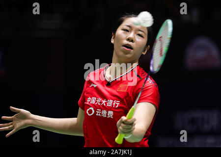 Chinese professional badminton players Jia Yifan and Chen Qingchen compete against Japanese professional badminton players Misaki Matsutomo and Ayaka Stock Photo