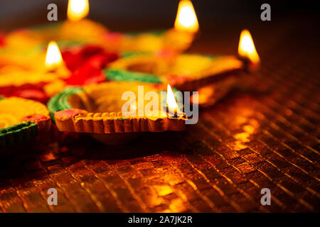 Close-up Lit Oil-lamps Diyas Illuminated Deepavali Festival Celebration in-India Stock Photo