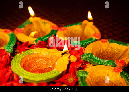 Close-up Liting Diyas Oil-lamps Illuminated Diwali Festival Celebration in-India Stock Photo