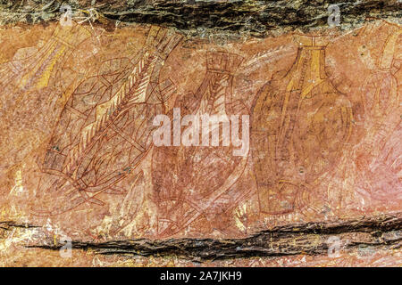 Ancient Aboriginal Art: hand prints, animal herds, spiral, Kakadu National Park, Australia Stock Photo