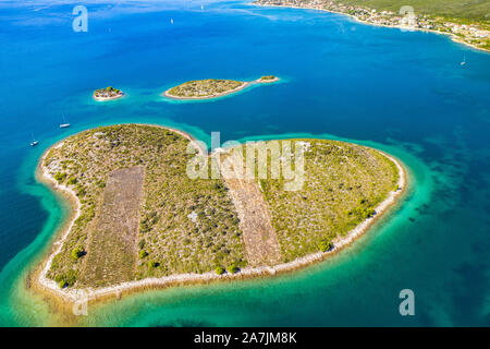 Croatia, Adriatic sea, aerial drone view of the amazing heart shaped island of Galesnjak, beautiful coastline Stock Photo