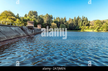 Lake with dam in the south of France on a sunny day Stock Photo