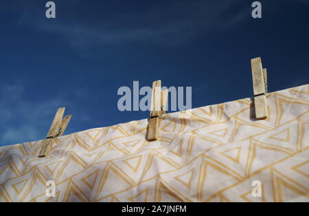 Wooden clothes pegs a plastic free solution. Stock Photo