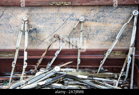 Old Geometry Instruments in a Box on a Market Stall for Sale Stock Photo