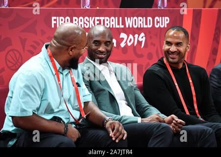 Former American NBA player Kobe Bryant, middle, shows up at the Spain vs Australia 2019 FIBA Basketball World Cup in Beijing, China, 13 September 2019 Stock Photo