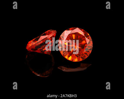 Light Red Semi-Precious Gemstone on a Black Background. Stock Photo