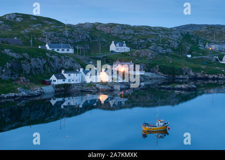 Fishing village at twilight, Scalpay, Isle of Harris, Outer Hebrides, Scotland, UK. Stock Photo