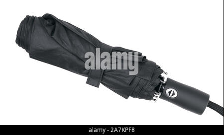 Black folding umbrella isolated on white background. Stock Photo