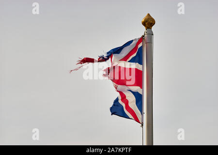 The UK Union flag in tatters.  Lyness, Hoy, Orkney, Scotland Stock Photo