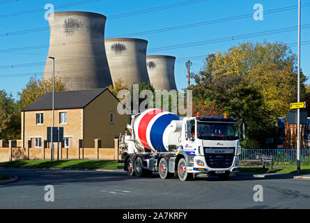 Cement mixing lorry passing Ferrybridge Power Station, West Yorkshire, England UK Stock Photo