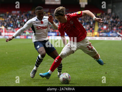 Charlton Athletic's Conor Gallagher and Preston North End's Darnell Fisher in action during the Sky Bet Championship match at The Valley, Charlton. Stock Photo