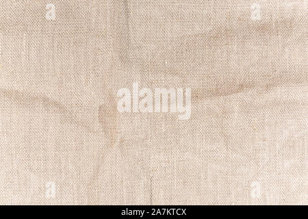 The texture of natural canvas. Background from rough fabric with small folds Stock Photo