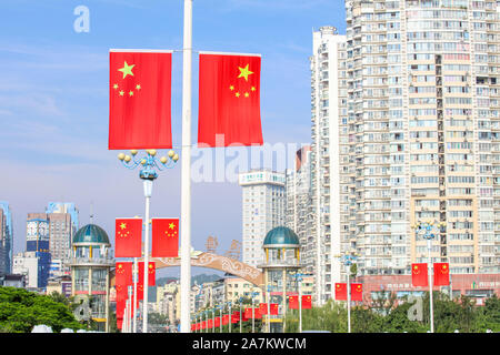 National flags are hung in various streets to celebrate the the 70th National Day of People's Republic of China in Suining city, southwest China's Sic Stock Photo
