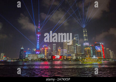 Night view of Huangpu River and the Lujiazui Financial District with illuminated skyscrapers and high-rise buildings in Pudong, Shanghai, China. Stock Photo