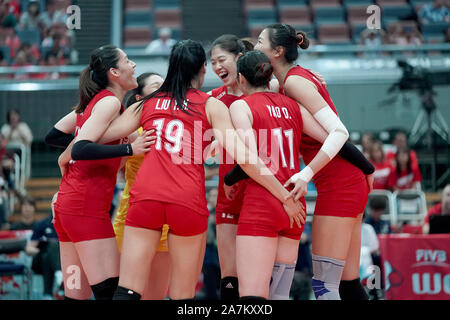 Members of China women's national volleyball team celebrate during the 2019 FIVB Volleyball Women's World Cup against Argentina in Osaka, Japan, Septe Stock Photo