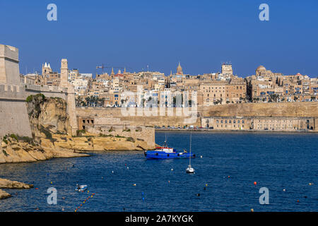 City skyline of Valletta in Malta as seen from the Grand Harbour. Stock Photo