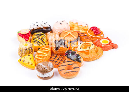 Childs toy plastic foods molded 1/6th scale assorted baked goods Stock Photo