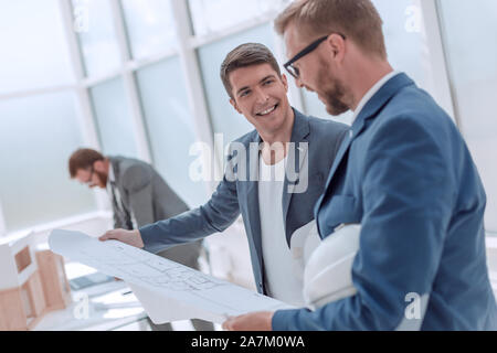 colleagues architects discussing sketches of the new project Stock Photo